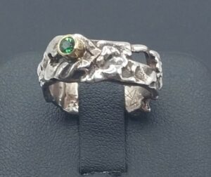 fused sterling silver ring with small green tourmaline set in 18 karat gold